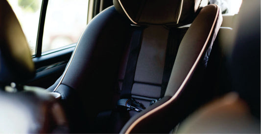 Close-up of a car seat with a blurred background